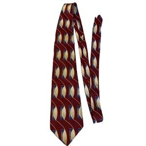 ZYLOS George Machado Tie​
